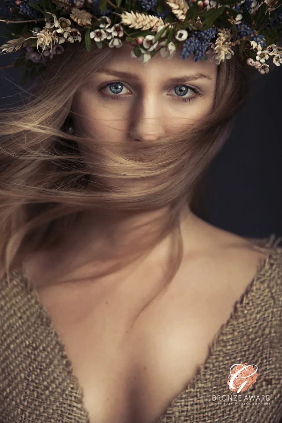 Portrait made against a hand-painted studio backdrop