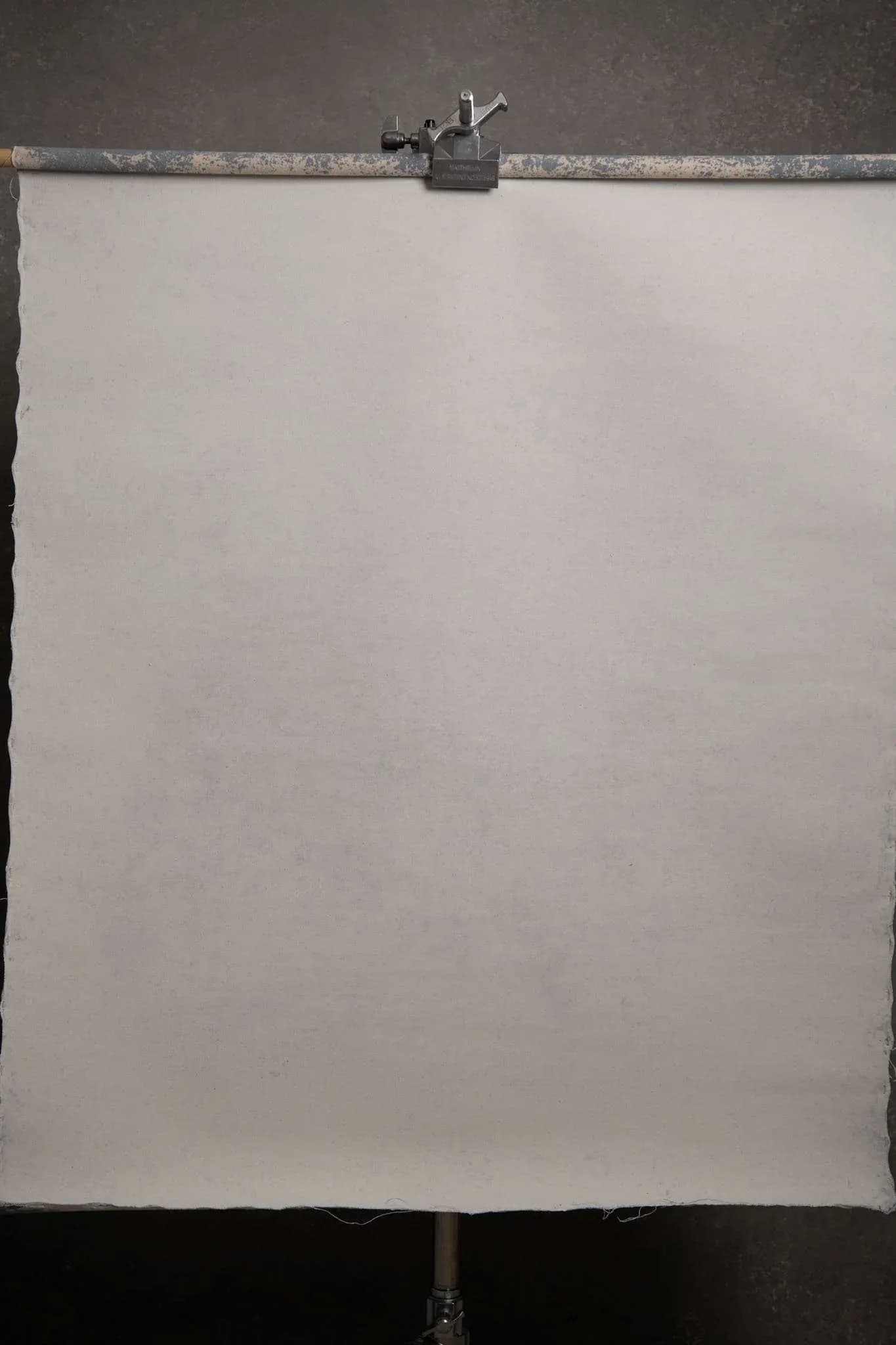 Hand painted grey backdrop with blue ish industrail style revers texture. 100x135cm (16422) ???